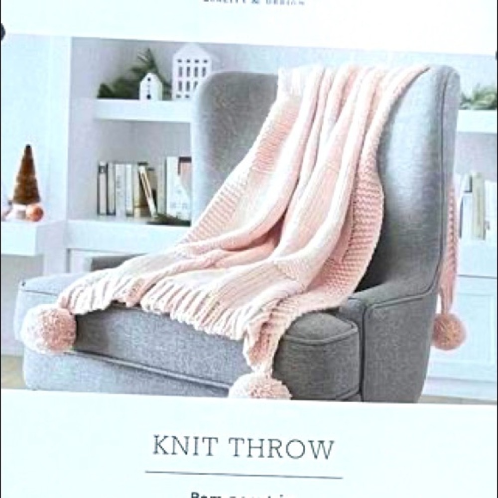 Pink pom pom throw